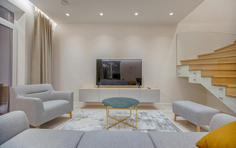 How to Layer Lighting in a Living Room to Create Depth and Ambiance Without an Electrician