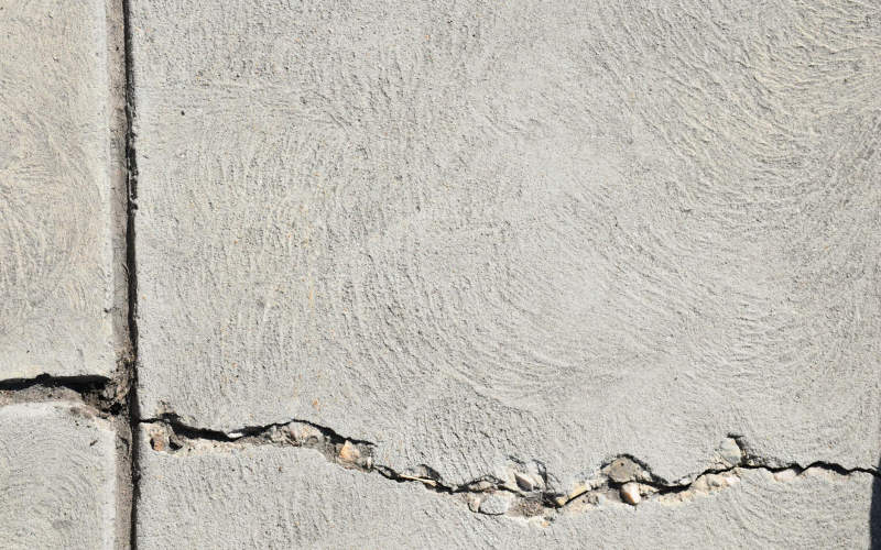 How to Repair Cracked Concrete Driveway Sections Yourself Before Winter Makes the Damage Permanent